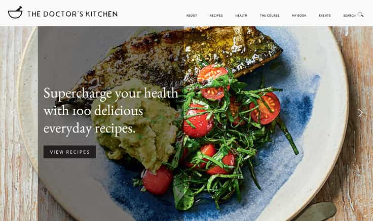 Website homepage with a lifestyle recipe shot of sardines and tomatoes on a blue plate.