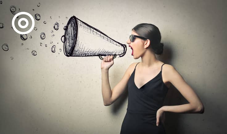 Young woman in black cocktail dress shouting into a pencil-drawn megaphone.